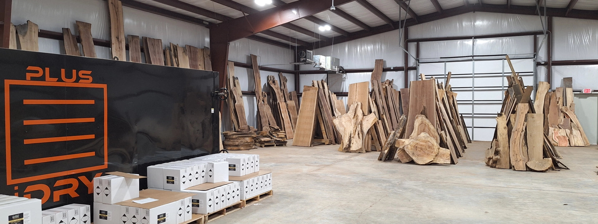 Warehouse with wood slabs, epoxy resin, and a kiln